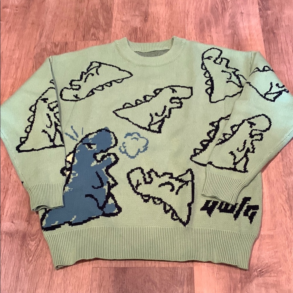 Playful Green Dinosaur Sweater